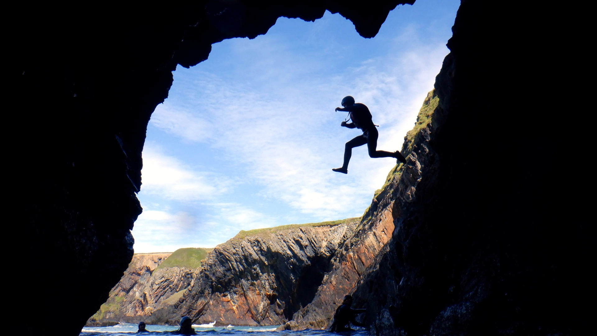 coasteer cave exploration cliff jump
